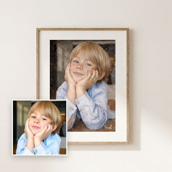 Framed portrait of a young boy with a smaller inset photo on a light background
